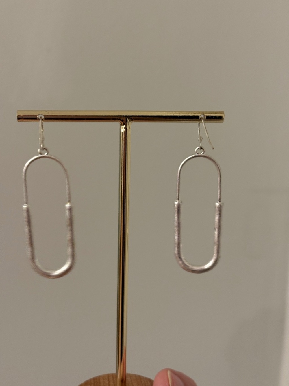 Elongated gold-tone open-oval drop earrings